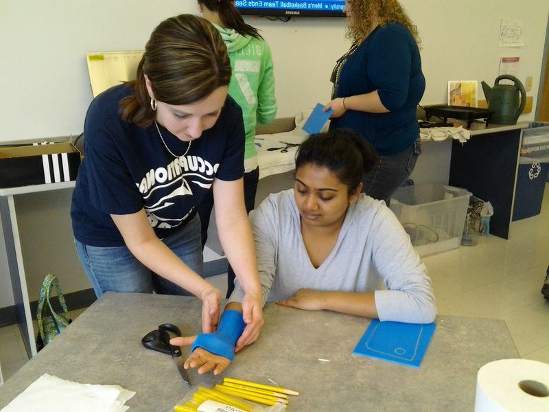 In OT 206, students participate in a hands-on splinting skills workshop.